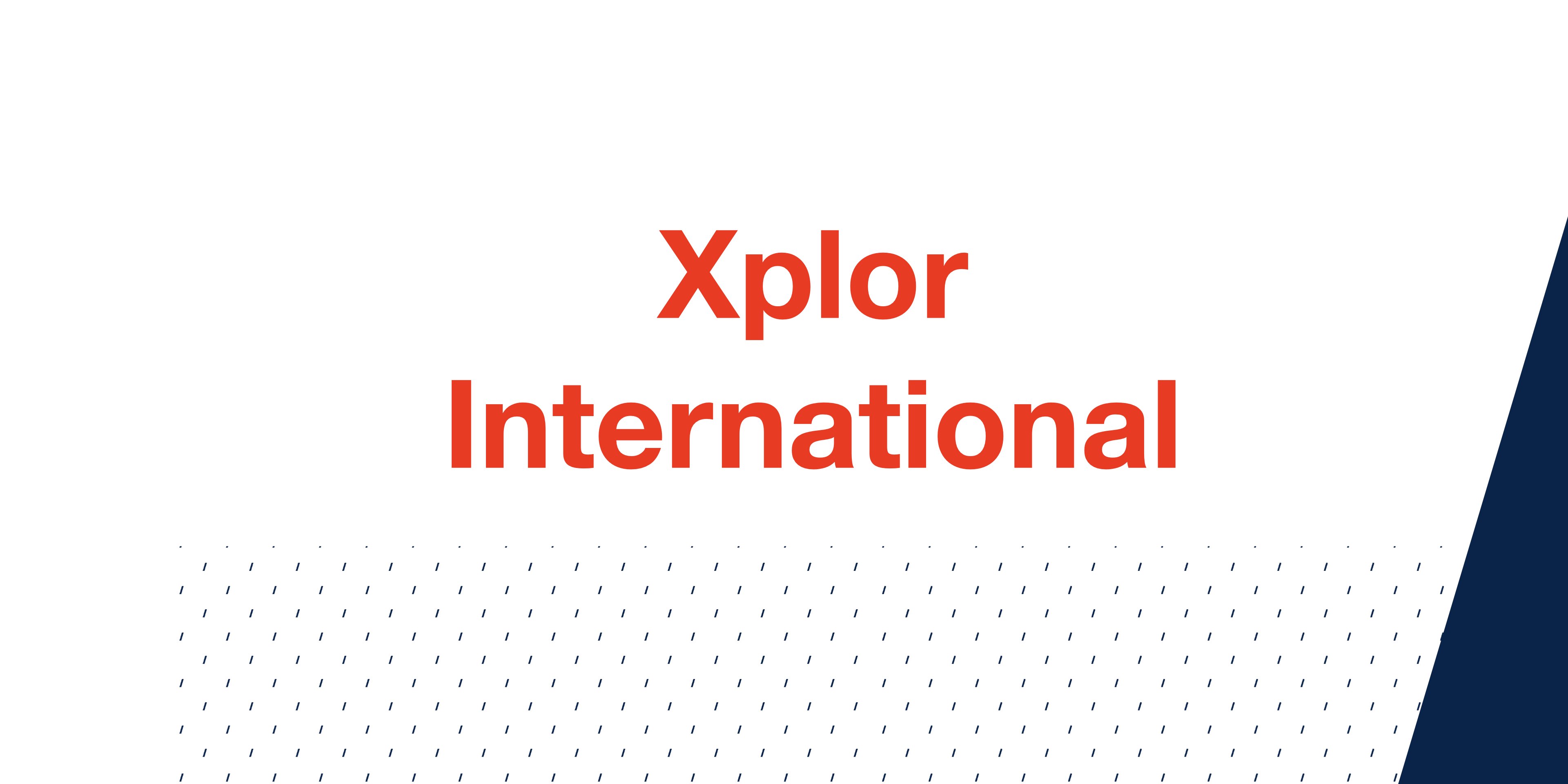 the text "xplor international" written in red on a white background