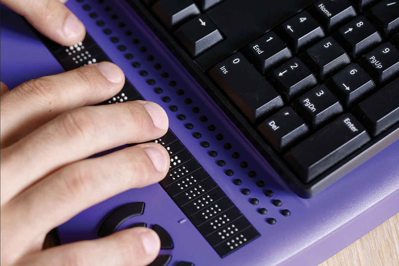 Person using Refreshable Braille Display