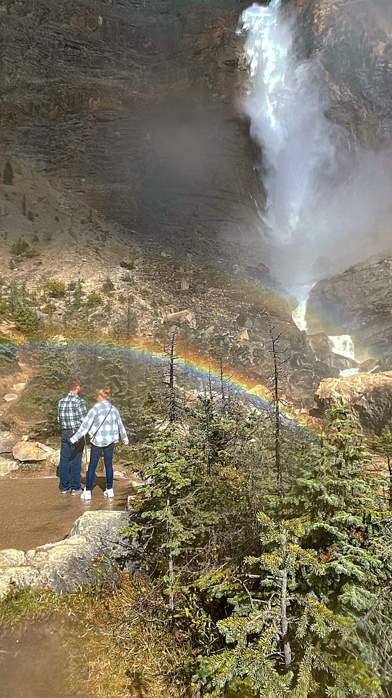 Aaron Page and his mother, Coyla, standing on the walking path leading up to Takakkaw Falls.