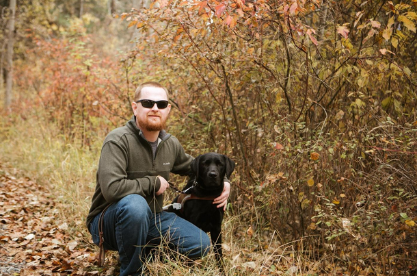 Aaron Page and his guide dog Jeb.